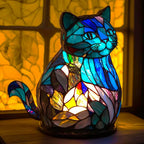 Cat mosaic stained-glass table lamp with teal, blue, and warm golden glow