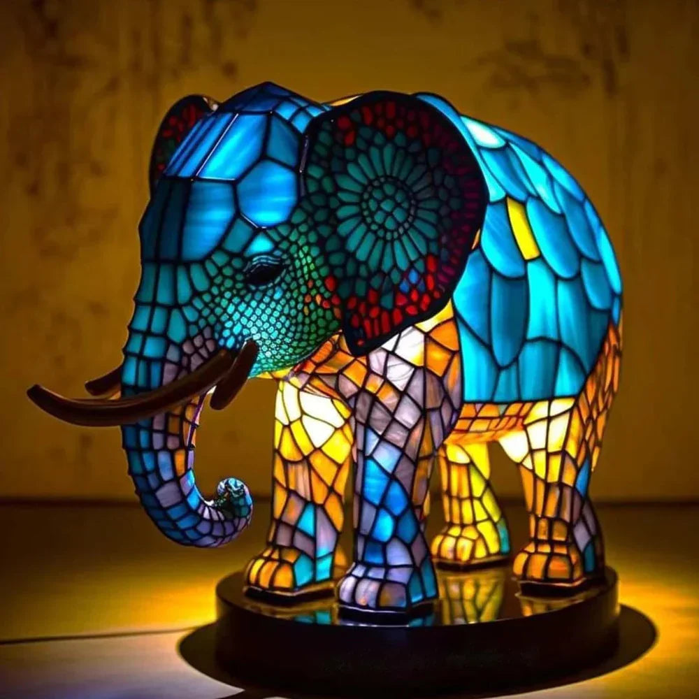 Elephant mosaic stained-glass table lamp with colorful blue and gold glow