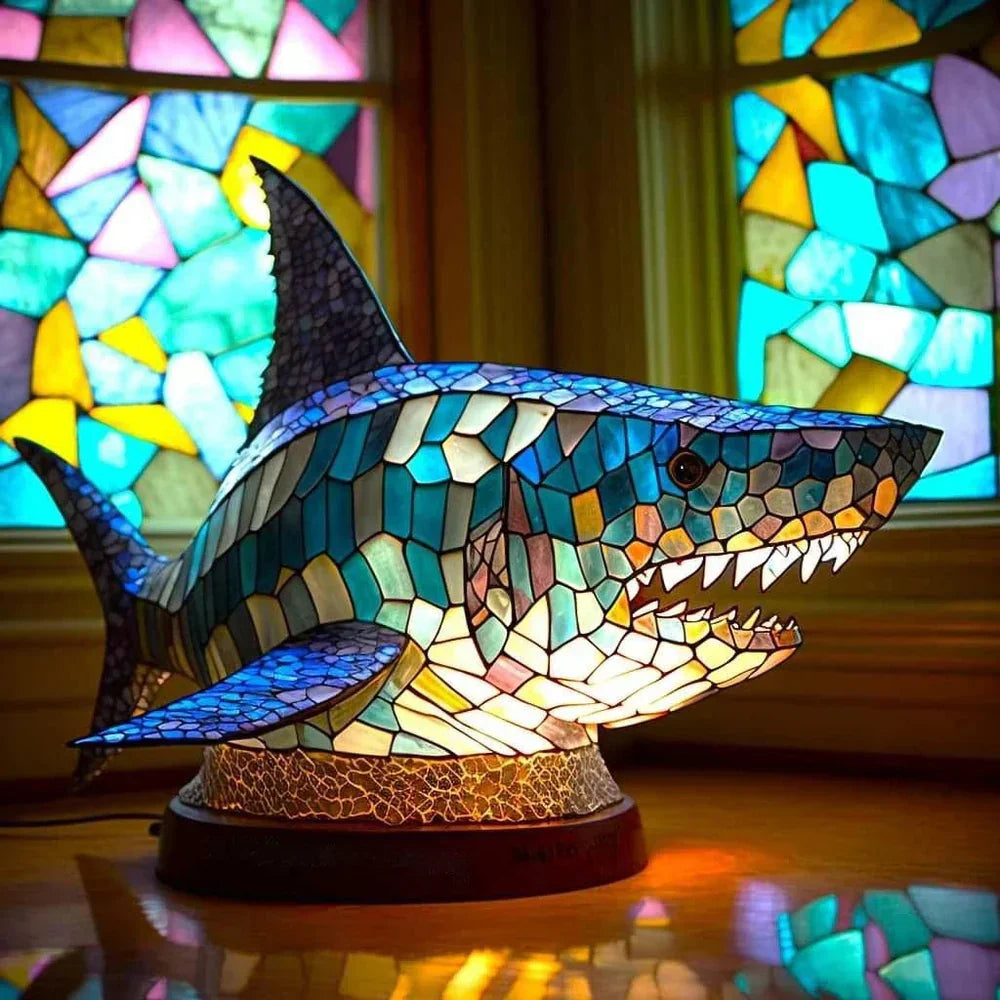 Shark-shaped stained-glass table lamp with bright glowing teeth and fins