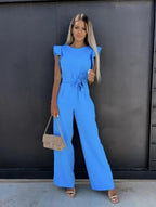 Blue wide-leg jumpsuit with flutter sleeves and belt
