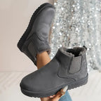 Dark gray suede low-cut slip-on boots with side elastic gore and faux-fur trim