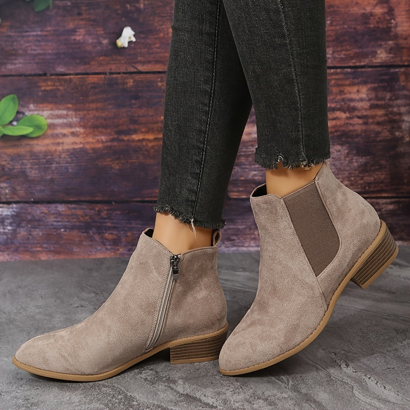 Taupe suede ankle boots with elastic side panels and low stacked heel
