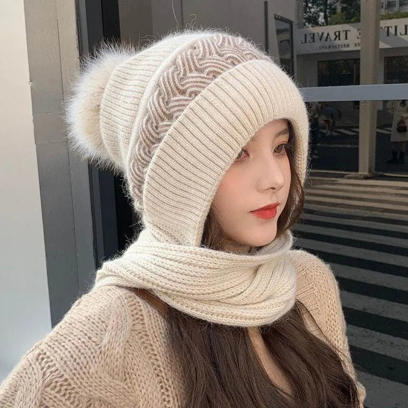 Beige knit beanie and infinity scarf set, swirl pattern, faux-fur pom-pom