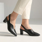 Black pointed toe slingback sandals with block heel and sling strap