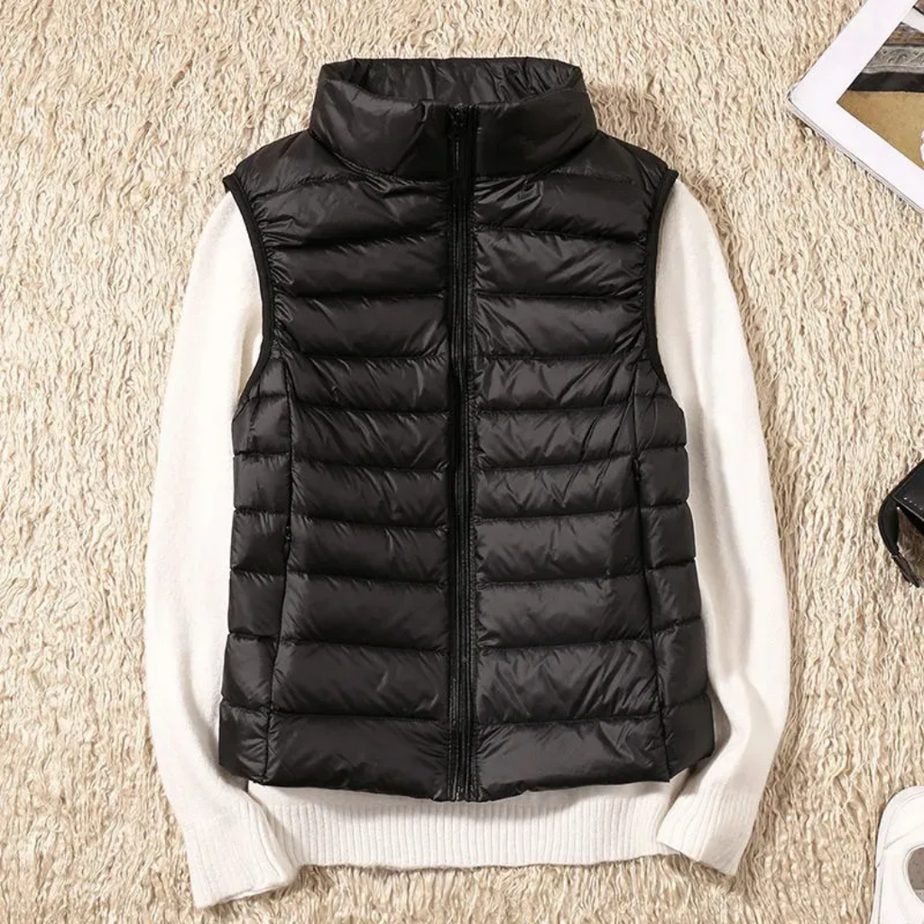 Ultralight quilted bodywarmer in black, sleeveless, full-zip with stand collar