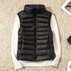 Ultralight quilted bodywarmer in black, sleeveless, full-zip with stand collar