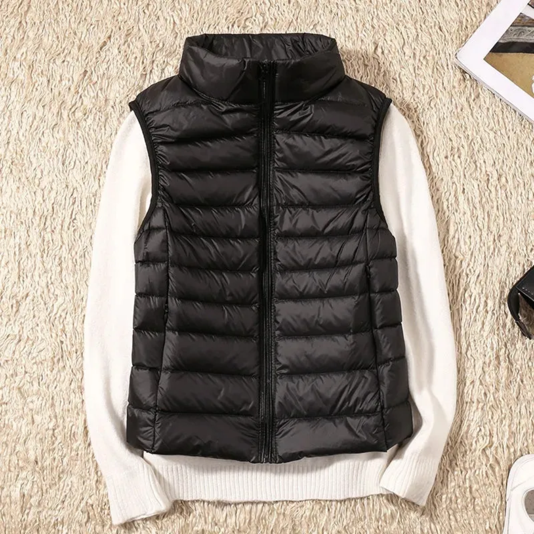 Ultralight quilted bodywarmer in black, sleeveless, full-zip with stand collar