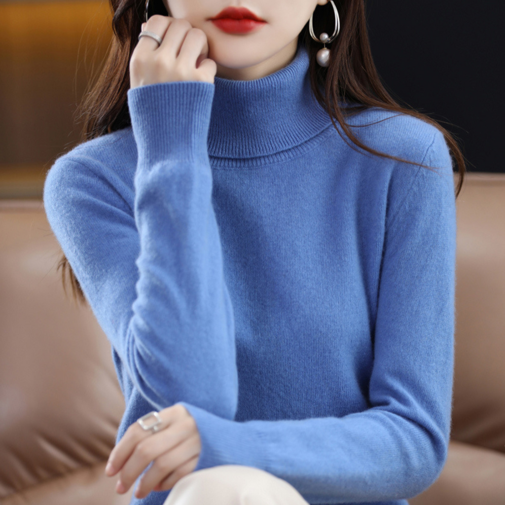 Cashmere turtleneck sweater with long sleeves, light blue knit.