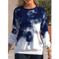 Women's round-neck tie-dye sweater in blue and white, long sleeves with ribbed cuffs.