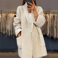 Women’s cream open-front knit cardigan with roomy patch pockets and relaxed fit