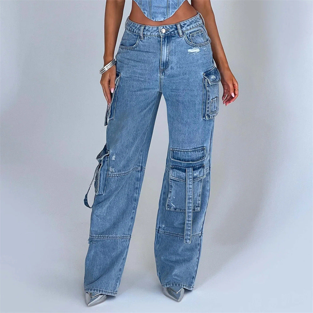 High-waist blue denim cargo pants with utility pockets and relaxed wide-leg fit