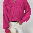 Women’s cable knit sweater with lantern sleeves, bordeaux red, textured cable yoke.