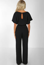 Black high-waist jumpsuit with short sleeves and open keyhole back cutout
