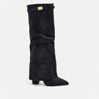 Black knee-high suede boots with buckle strap and pointed toe