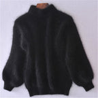 Black loose knit wool sweater with high neck and long wide sleeves