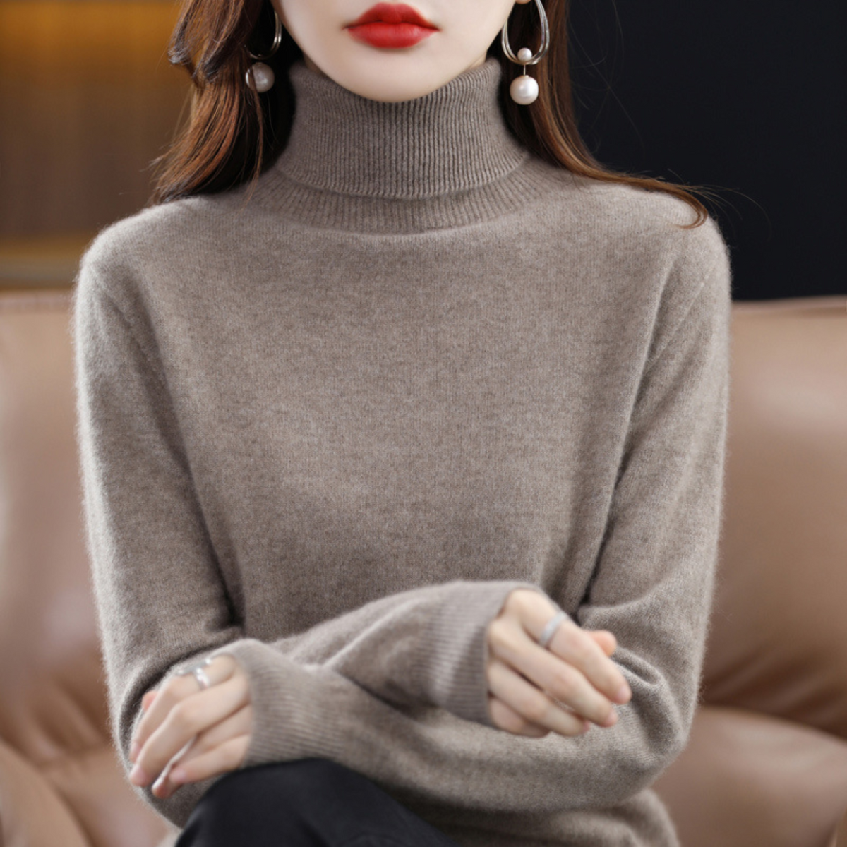 Women's cashmere turtleneck sweater in dark taupe, long sleeves, ribbed collar and cuffs.