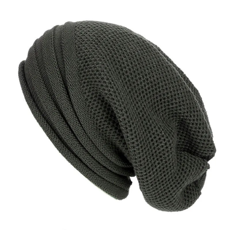 Dark gray knitted beanie with textured weave and folded cuff