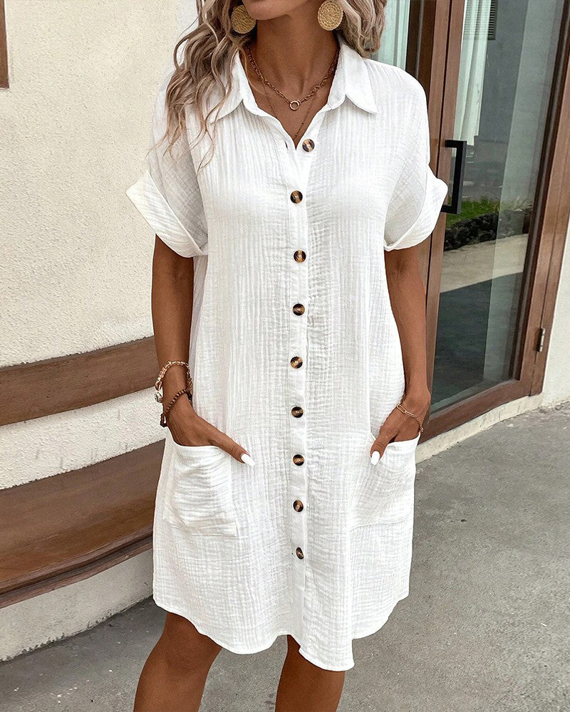 White collared mini button-front pocket dress, front view, chest buttons, side pocket