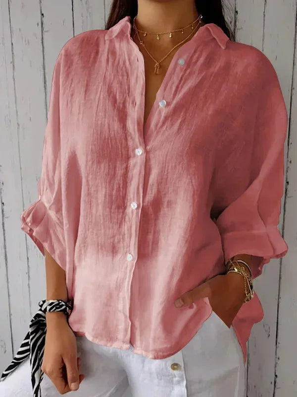 Pink relaxed button-front blouse with point collar and rolled sleeves