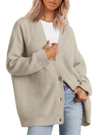 Light beige cashmere cardigan with V-neck, ribbed knit, button front.