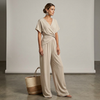Women’s taupe jumpsuit with V-neck, short sleeves, wrap front tie waist, wide cropped pant legs