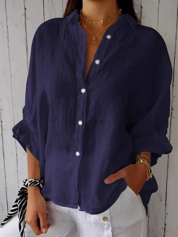 Navy relaxed button-front blouse with point collar and rolled sleeves