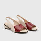 Red open-toe wedge sandals with supportive wide heel and cream straps