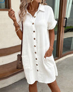 White collared mini button-front pocket dress, short sleeves, button placket