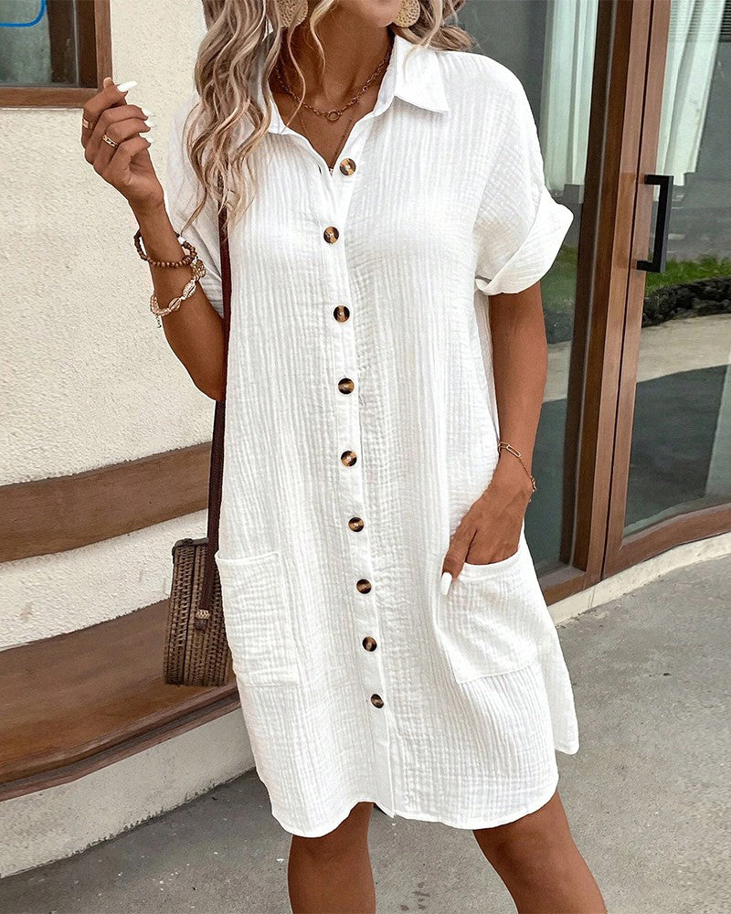 White collared mini button-front pocket dress, short sleeves, button placket