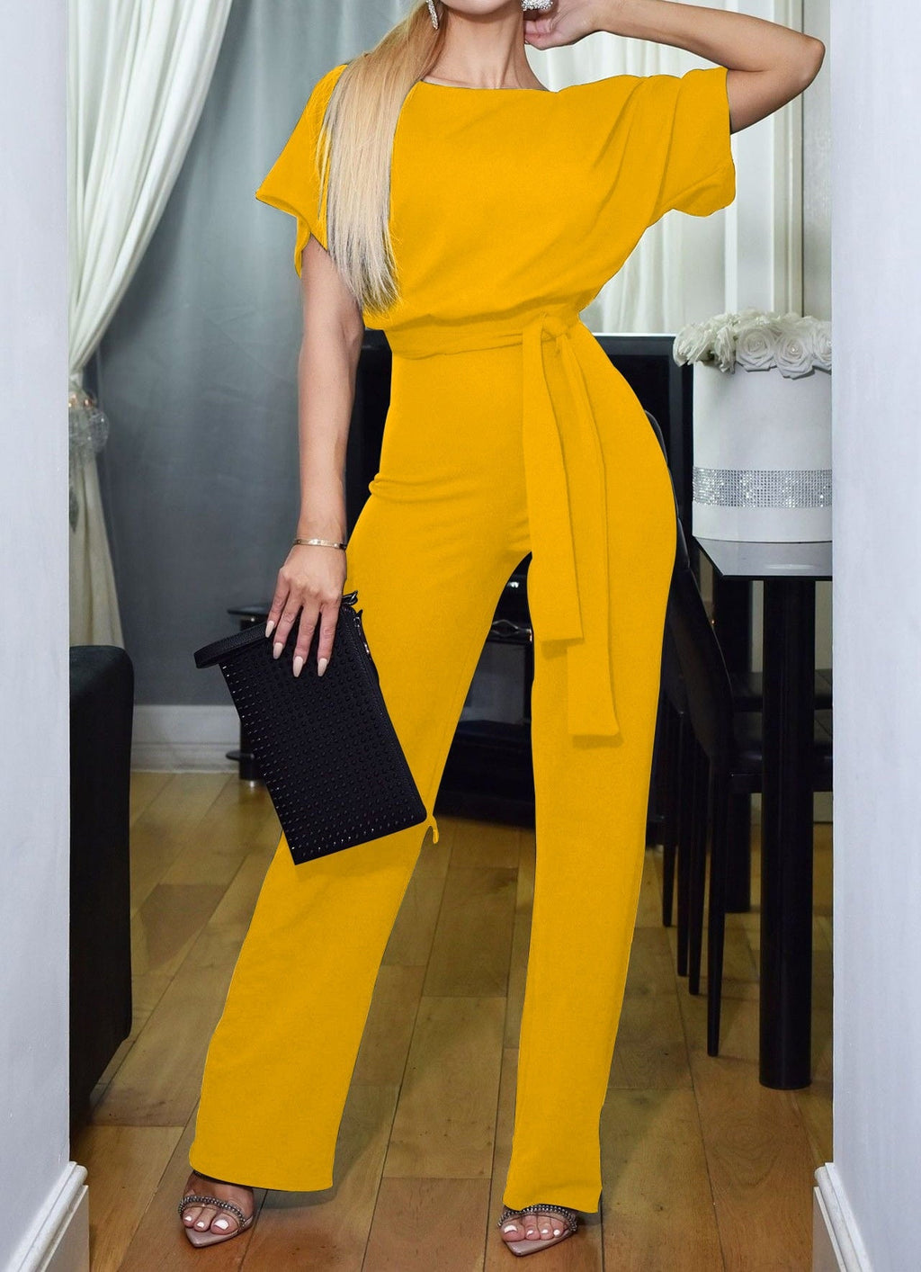 Yellow high-waist jumpsuit with short sleeves and tie waist sash, wide legs
