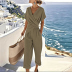 Women’s olive-brown V-neck jumpsuit with short sleeves, wrap front and tie waist, wide cropped legs