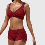 Burgundy bikini set with cross-front bralette and ruched drawstring swim shorts