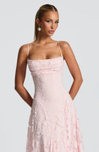 Light pink spaghetti-strap maxi dress with textured fabric and corset-like seams