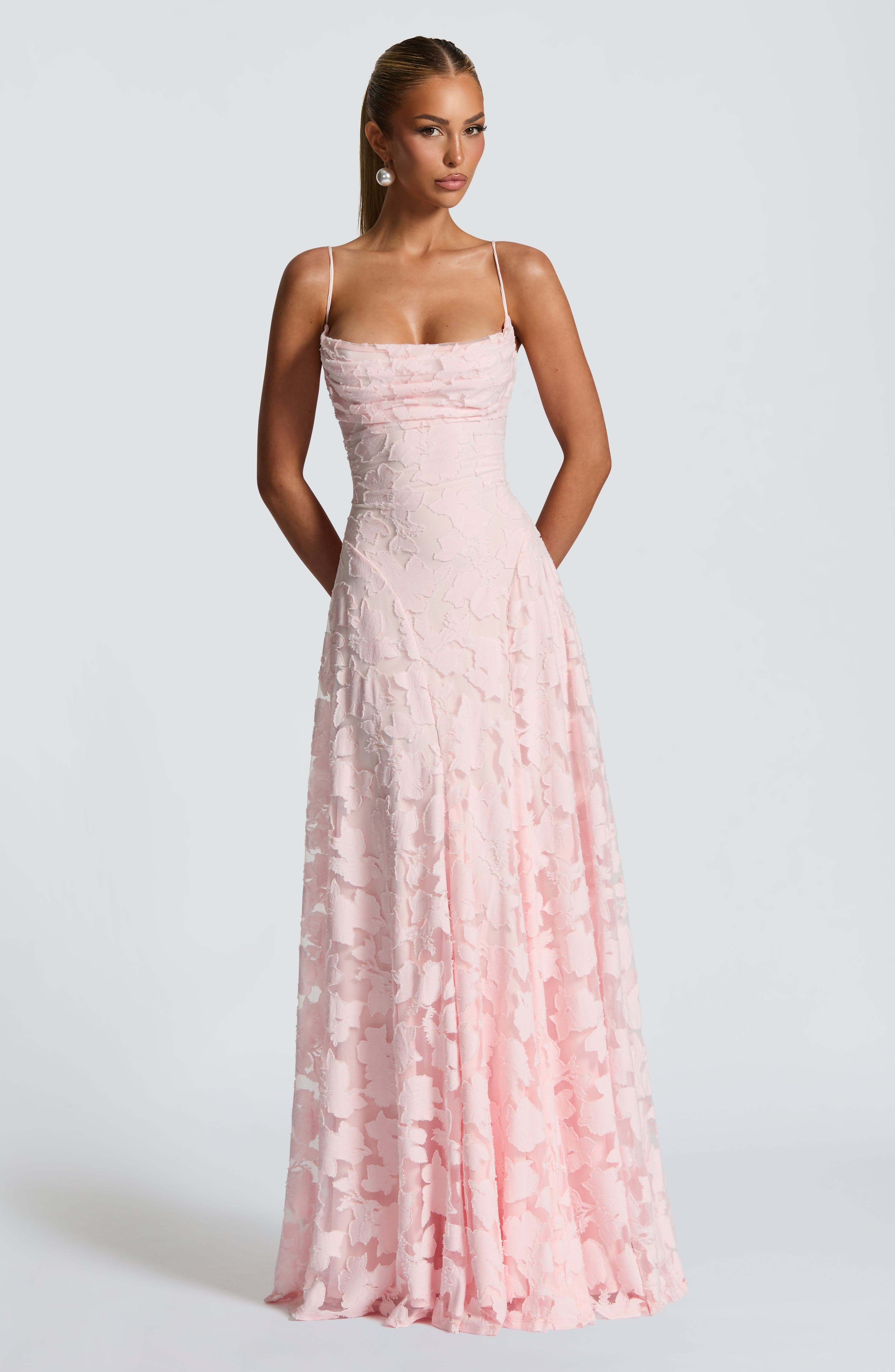 Blush pink maxi evening dress with spaghetti straps, fitted bodice, lace A-line skirt