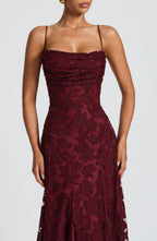Burgundy spaghetti-strap maxi dress with sweetheart bodice and textured jacquard