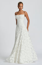 White maxi evening dress with spaghetti straps, fitted bodice, lace A-line skirt