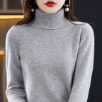 Women's cashmere turtleneck sweater in gray, long sleeves, ribbed collar and cuffs.