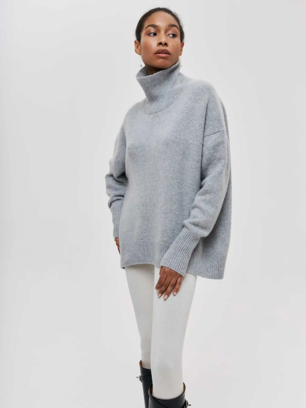 Heather blue knitted turtleneck sweater with long sleeves and ribbed neckline