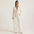 Cream ruffled V-neck lace-up blouse and wide-leg pants set, long sleeves