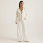 Cream ruffled V-neck lace-up blouse and wide-leg pants set, long sleeves