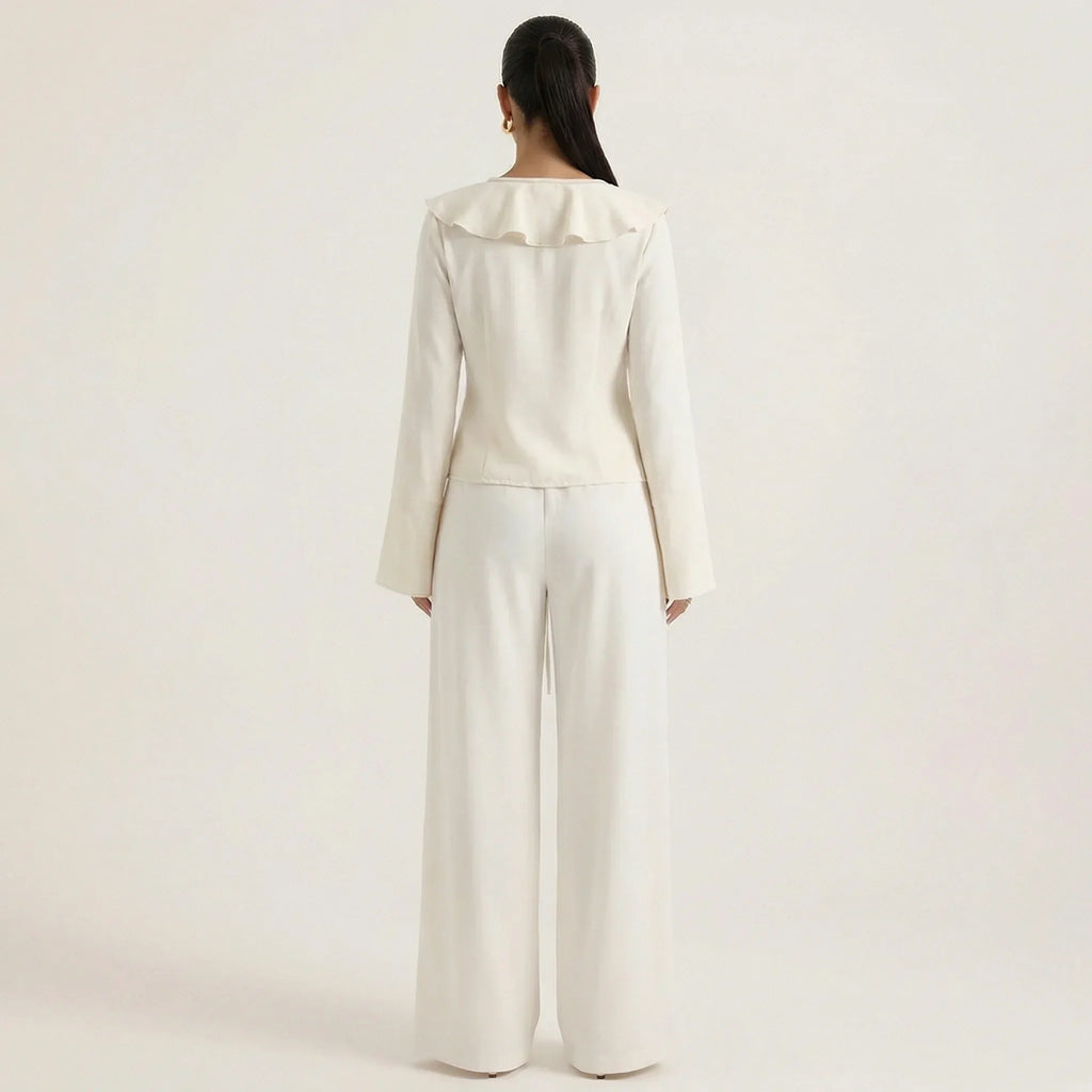 Cream ruffled blouse and wide-leg pants set, back view with long sleeves