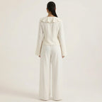Cream ruffled blouse and wide-leg pants set, back view with long sleeves