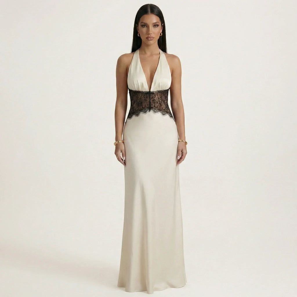 Cream halter maxi dress with deep V front and black lace waist panel, sleeveless.