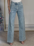 Light blue high-waist wide-leg denim jeans with sparkling details and classic front closure.