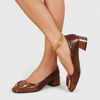Women's brown croc-texture loafers with buckle detail and block heel, slip-on style