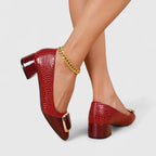 Women's red croc-texture loafers with gold buckle strap and block heel, slip-on