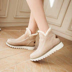 Women’s light beige ankle platform boots with sherpa trim and stitched side panels