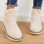 Women’s light beige suede ankle platform boots with sherpa collar and textured sole