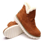 Women’s brown ankle platform boots with sherpa lining, stitched seams, rubber sole