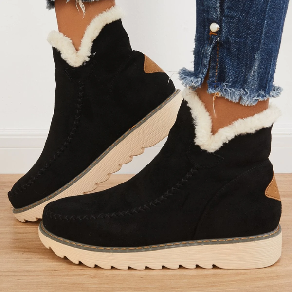 Women's ankle platform boots in black suede with cream sherpa trim and stacked sole